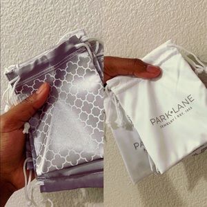 2 sets of jewelry/ crafts small bags